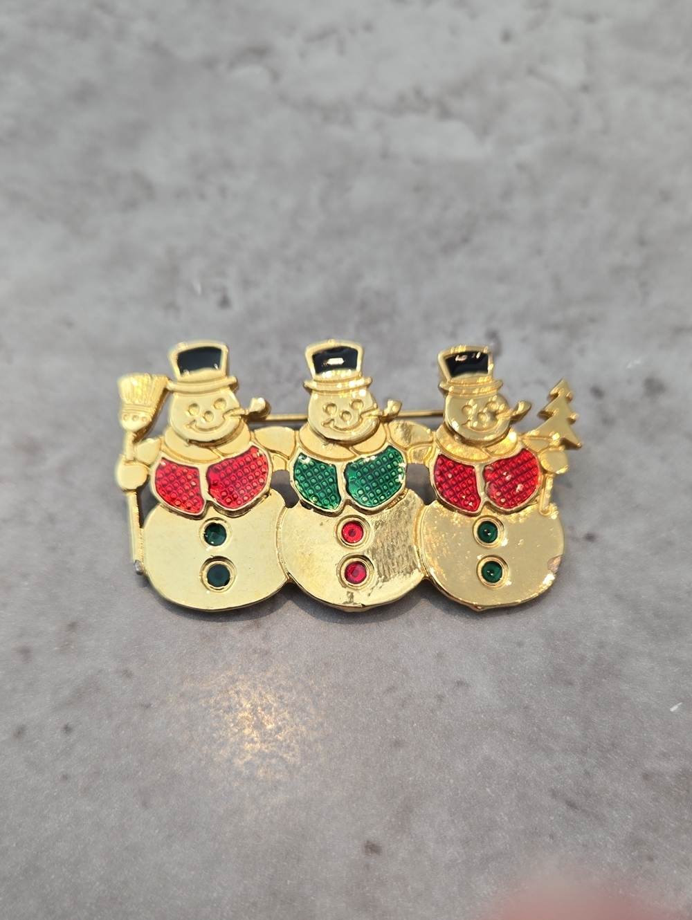 Vintage Newpro Gold-Tone Festive Snowmen Brooch with Red and Green Accents